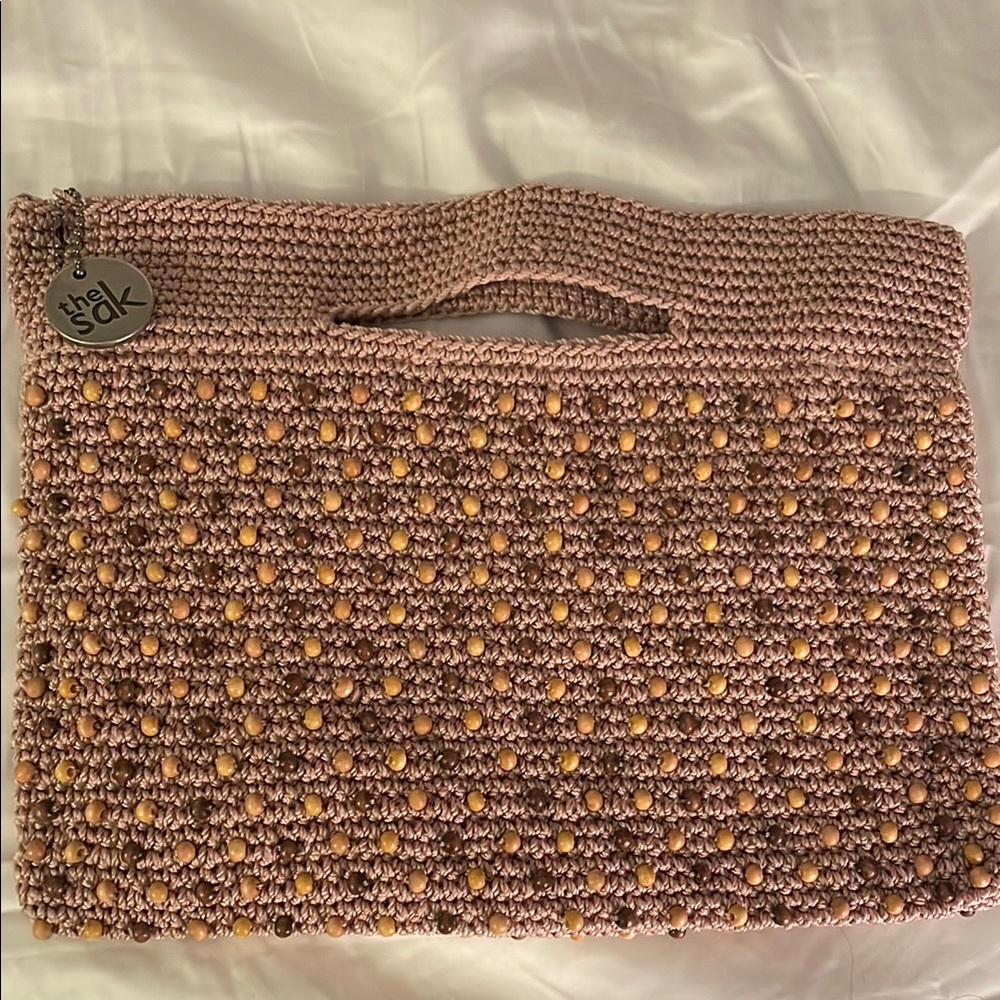 The Sak Crochet Clutch in Pink and Tan